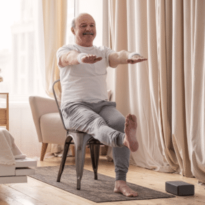 Senior doing leg lifts exercises in a chair